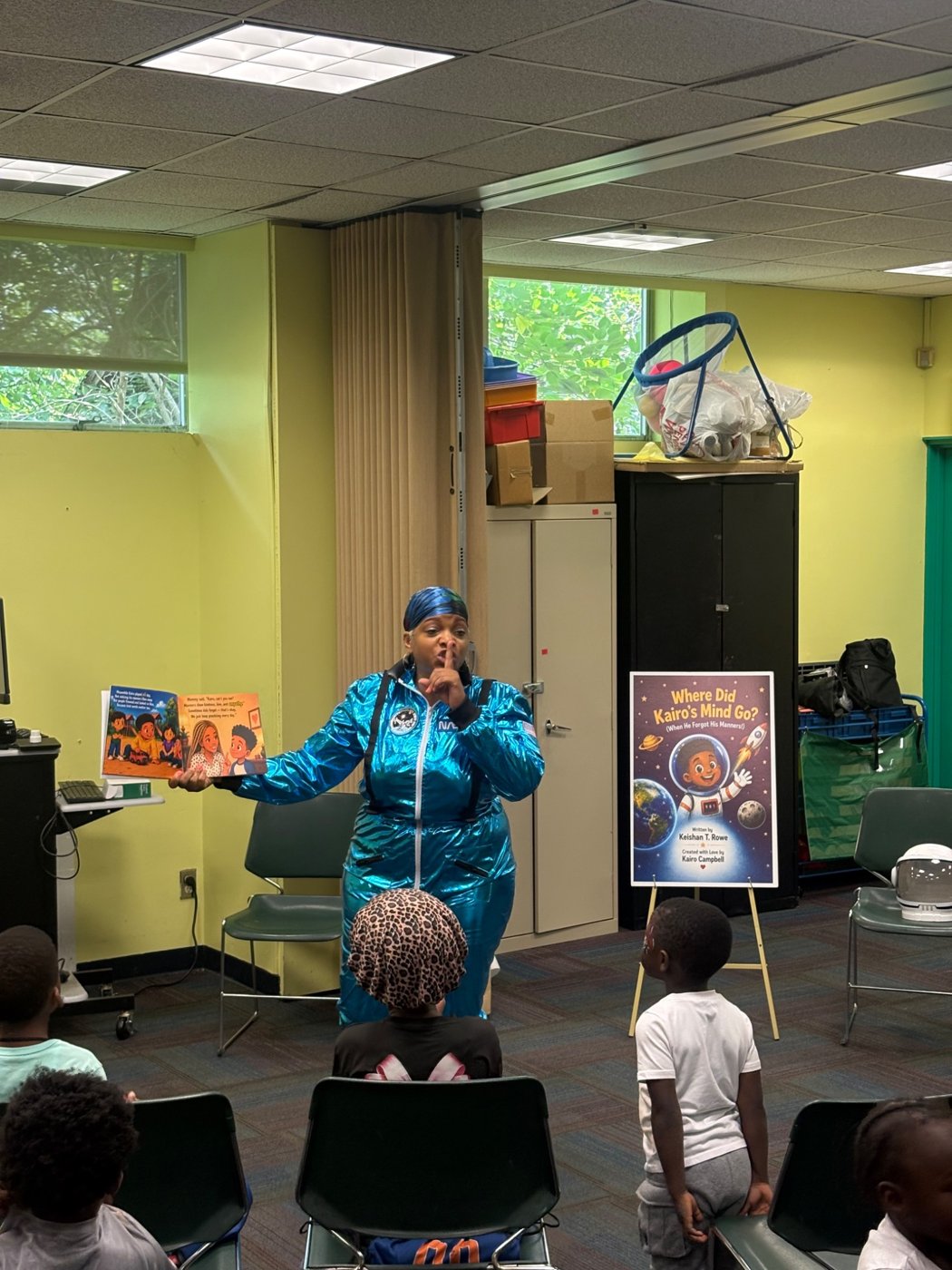 Captain Keishan leading a storytelling session at Laurelton Library